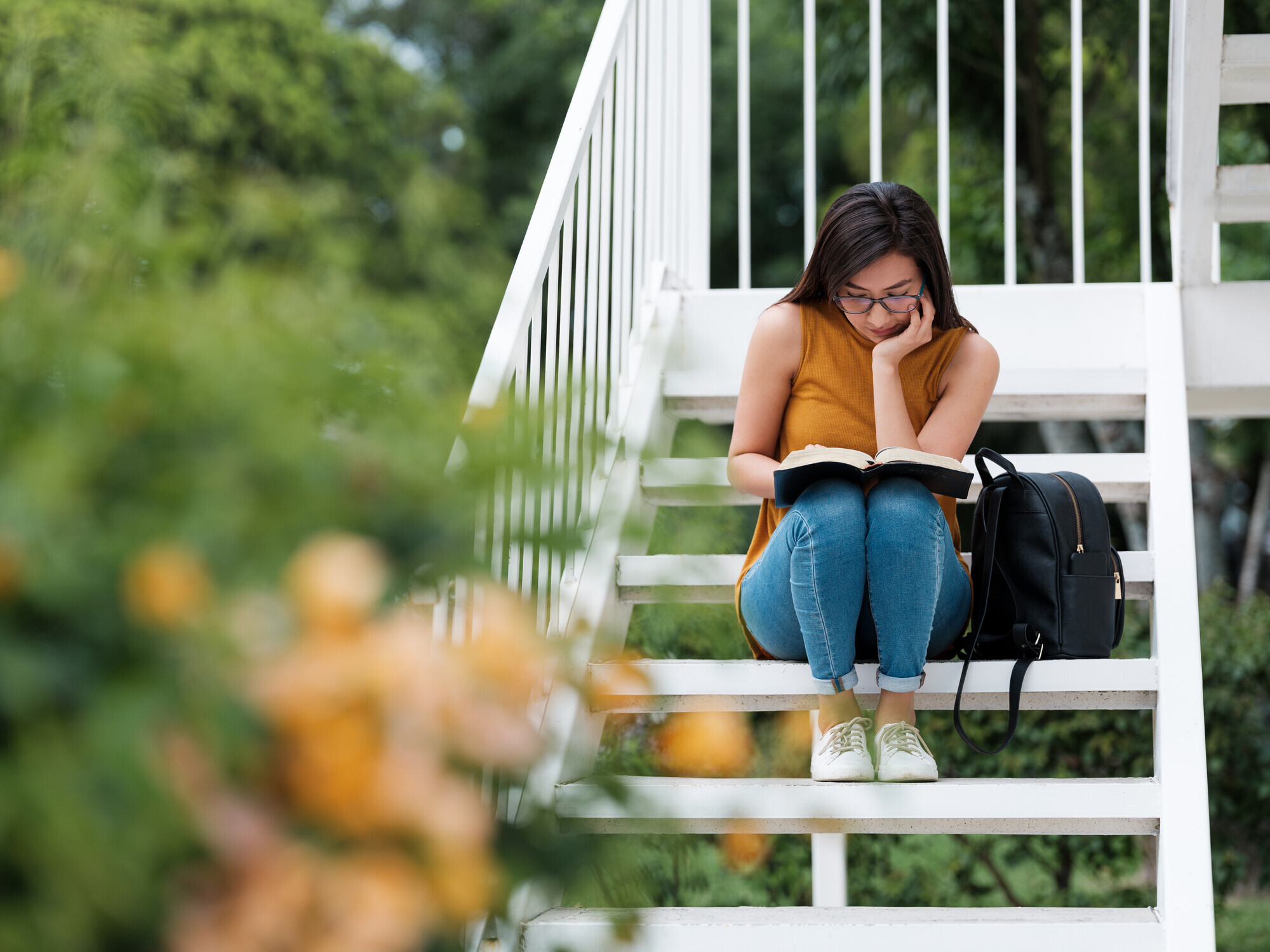 Reading, Young Women,  Concentrated,Campus, Stairs, Student, Millennial, Latin,