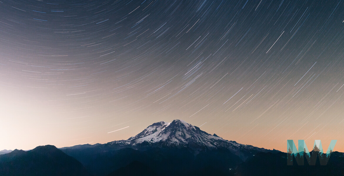 Long-exposure night photograph of Mount Rainier