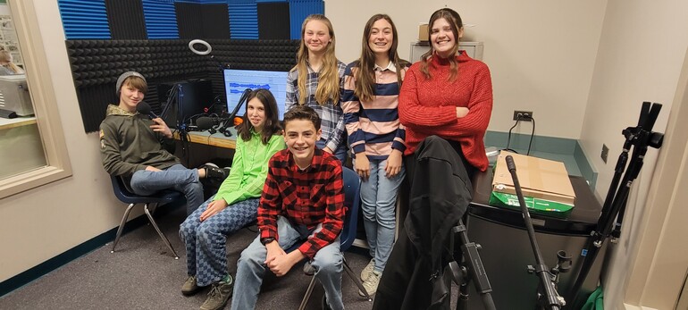 The students produce a podcast called BoomBox.