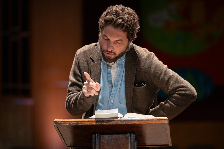 Tiago Arrias preaches.