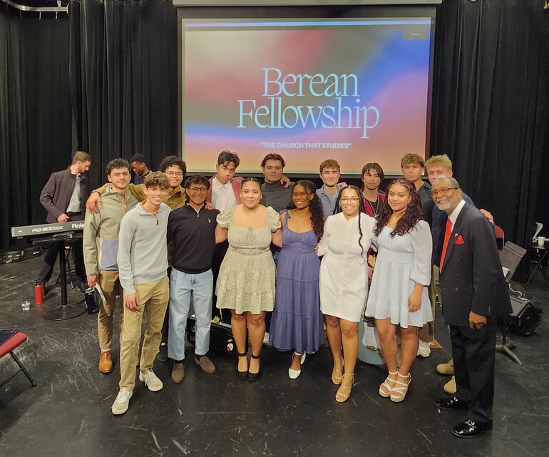 Group photo of diverse students in church