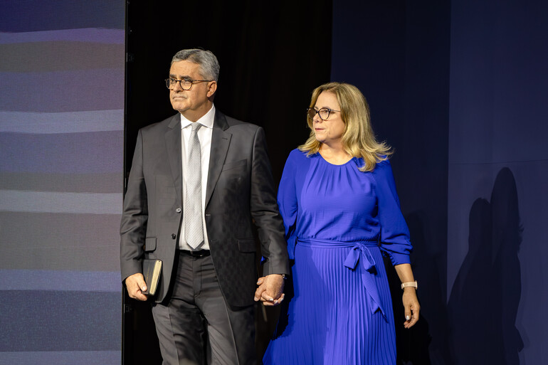 President Elect Erton Carlos Köhler and his wife walking onto stage at the 62nd General Conference Session of the Seventh-day Adventist Church, America’s Center Convention Complex, St. Louis, Missouri, USA, July 3-12, 2025. Camera date: Friday, July 4, 2025 15:54.