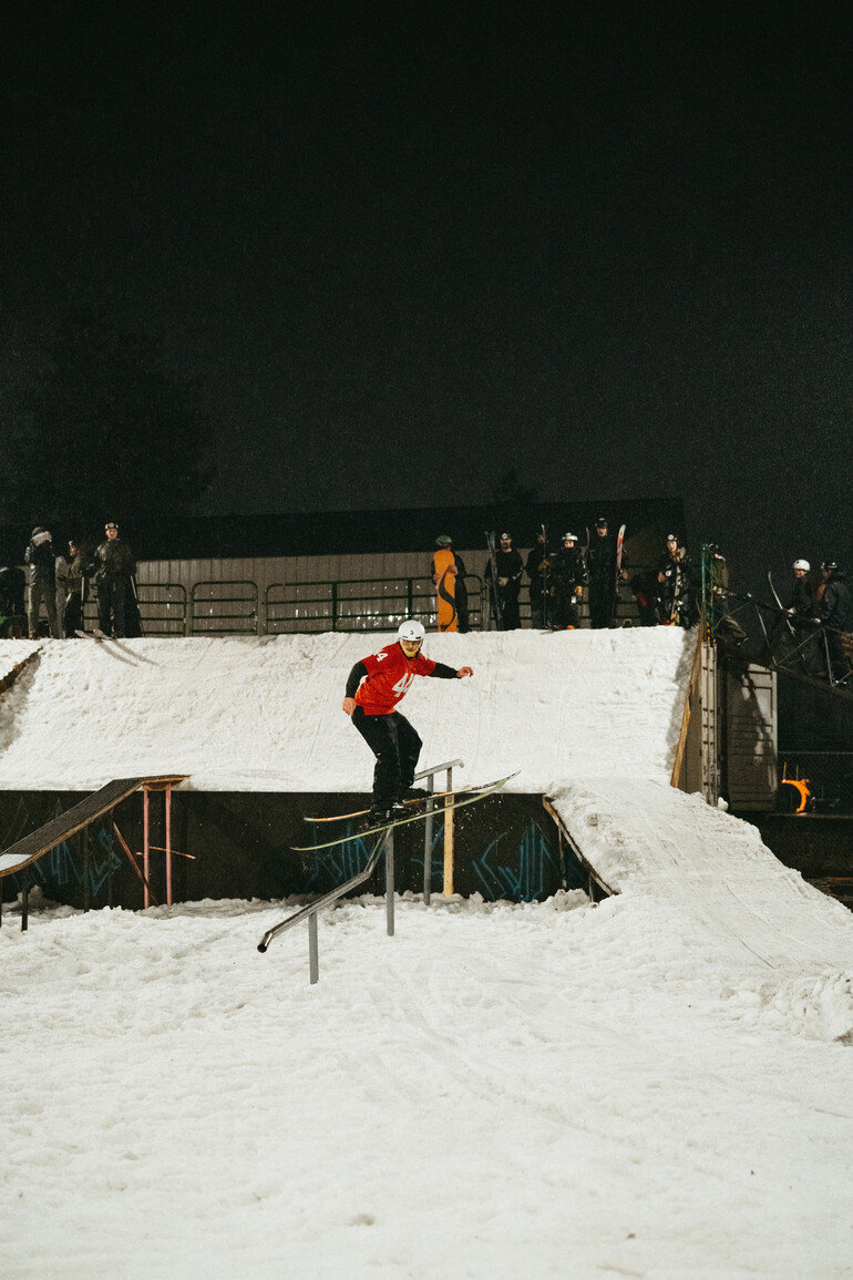 Skier balancing on rails