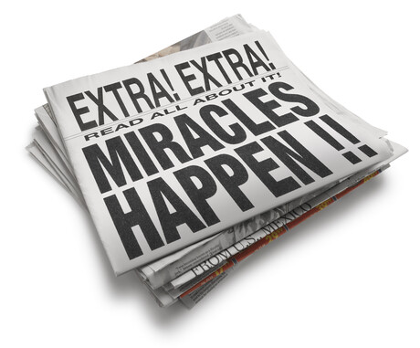 Newspaper with big headline that says, "Miracles Happen."