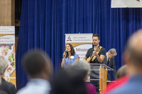 Allen and Leah Botimer, Cloverdale Church members, lead the delegates in praises of worship at the 55th Regular Constituency Session of the Idaho Conference on Sunday, September 17, 2023, on the campus of Gem State Adventist Academy, in Caldwell, Idaho.