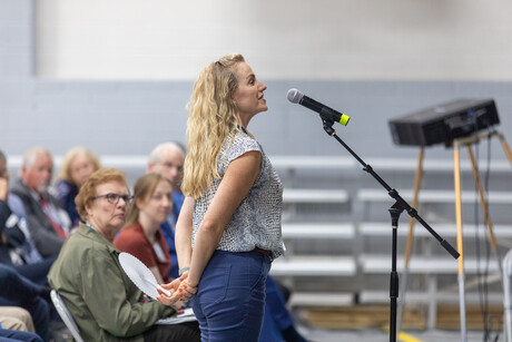 Delegates speak at the microphone to motions on the floor during the 55th Regular Constituency Session of the Idaho Conference on Sunday, September 17, 2023, on the campus of Gem State Adventist Academy, in Caldwell, Idaho.