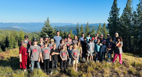 students assembled outdoors for a group photo