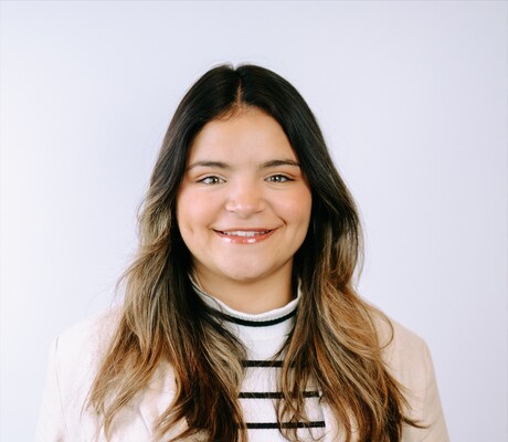 Abi Martinez-Perez smiling.