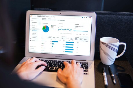 Laptop screen of data charts 