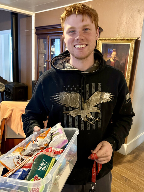 Pleased Young Man Receiving a Goodie Box!