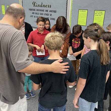 Pastor Edward Nelson with students