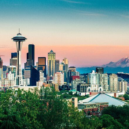 Seattle Skyline and Mount Rainier at Sunset on a clear summer day.