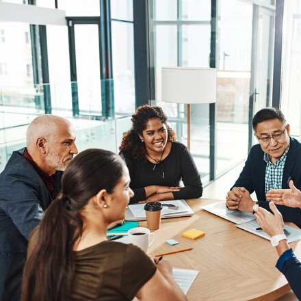 Shot of a group of businesspeople having a meeting in an office