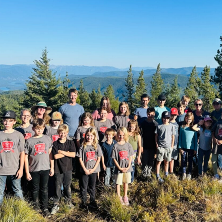 students assembled outdoors for a group photo