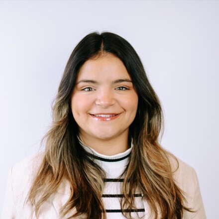 Abi Martinez-Perez smiling.