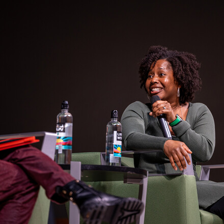 Jalysa Conway on stage for her Q&amp;A colloquium