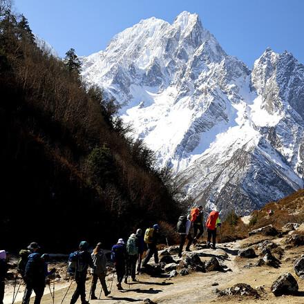 a group hiking through high mountains