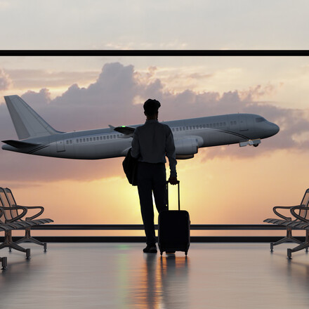 Silhouette of a man walking in the airport as the plane takes off during sunset. 3D illustration