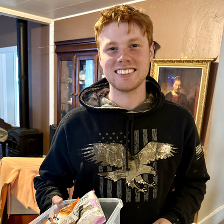 Pleased Young Man Receiving a Goodie Box!