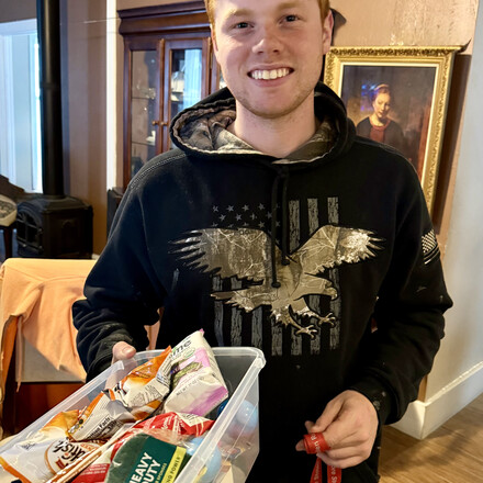 Pleased Young Man Receiving a Goodie Box!