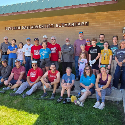 CAES workbee volunteers come together to care for the school campus