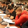 Men attending a seminar.