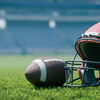 the background of a red football helmet on the pitch, 3d rendering