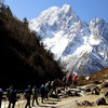 a group hiking through high mountains