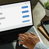 Man chatting on mobile phone chat message chatting in the global Internet network via messengers