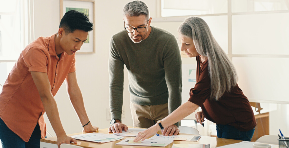 Collaboration, documents or business people in meeting planning a group startup project together. Strategy, brainstorming ideas or workers with data analytics paperwork for our vision or sales goals