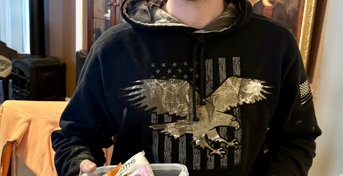 Pleased Young Man Receiving a Goodie Box!